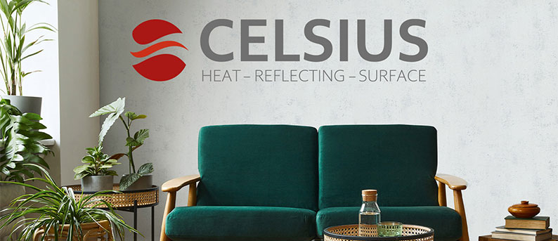 Celsius Tapete mit Wärmeschutzfunktion von Marburg Grünes Sofa vor Celsius-Wärmeschutzwand im Wohnzimmer