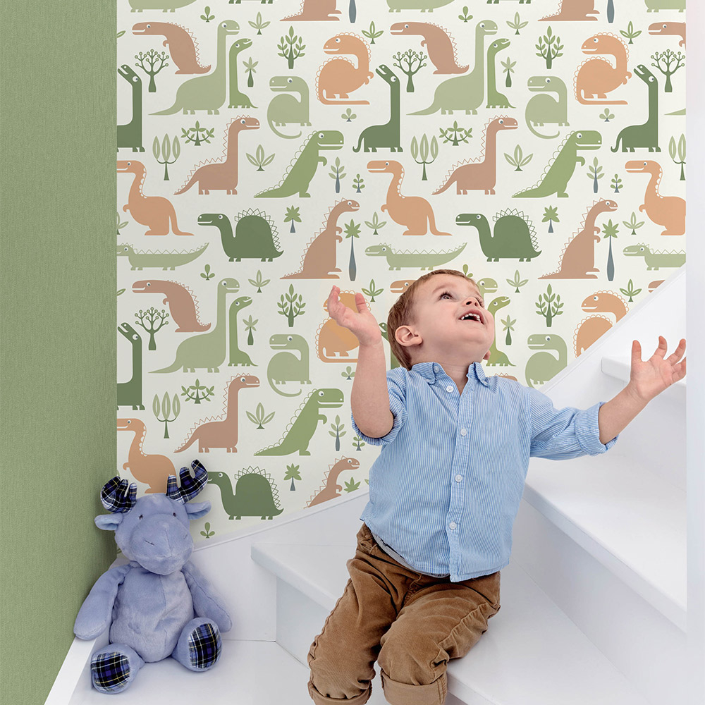 Grüne Dinotapete mit verschiedenen Dinosauriern für das Kinderzimmer.